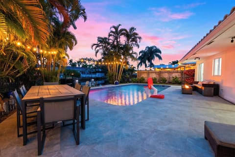 Pool days meet canal views—dine al fresco under the palms, then unwind poolside just steps from the water.