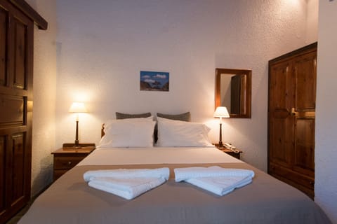 Apartment, 1 Bedroom | In-room safe, individually decorated, desk, iron/ironing board