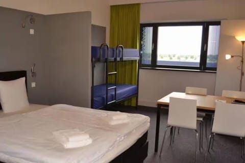 Unwind together in a bright room with flexible beds.