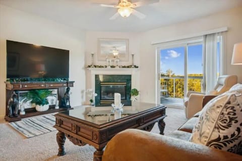 Spacious Living Room with Gas Fireplace, Sleeper Sofa and SMART TV with Cable & WIFI throughout vacation rental