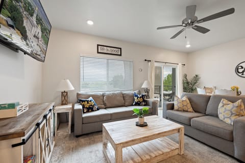 Spacious and cozy living room for everyone to enjoy popcorn and a movie