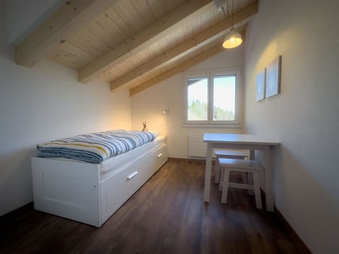 Bed, Furniture, Bedroom, Interior Design, Wall, Wood, Floor, Bedding, Ceiling, Flooring
