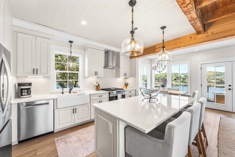 Prepare a fresh snack in this well-appointed kitchen featuring a large center island and modern appliances