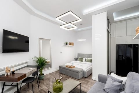 Deluxe Studio, Balcony, Courtyard View | Living area | Flat-screen TV