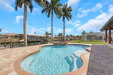 The pool has several seating ledges, providing restful spots to sit in the water while enjoying the sunshine.