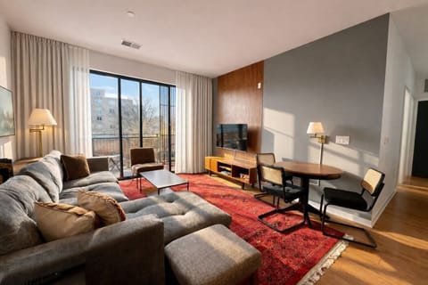 An open, light-filled space perfect for work, rest, and some fresh air on your private balcony