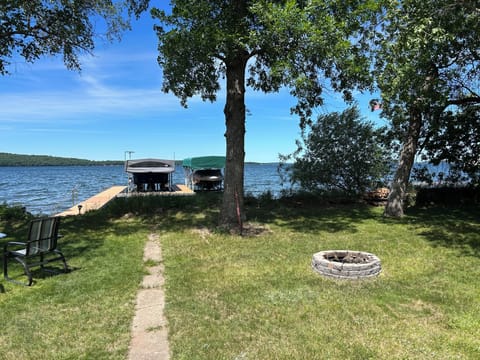 Enjoy a lakeside fire. Boat parking and easy access to the water w/dock stairs