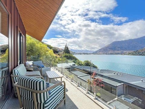 Private balcony with seating and stunning lake views
