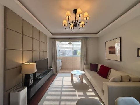 Superior Suite | Living area | 50-inch LCD TV with digital channels