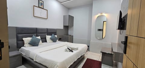 In-room safe, desk, laptop workspace, iron/ironing board