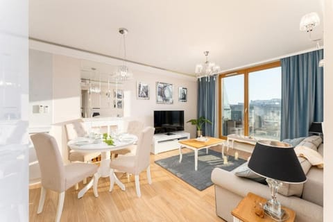 Deluxe Apartment, Balcony | Living area | Flat-screen TV