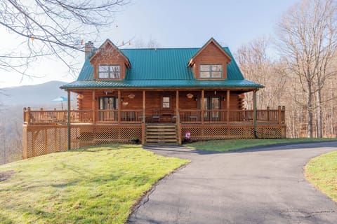 Inviting log cabin with a spacious front porch and peaceful mountain charm