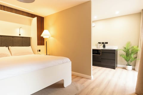 Stylish studio with kitchenette and half bathroom