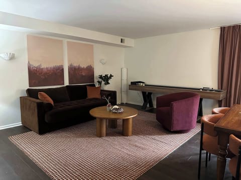 Comfortable living area with a sofa bed plus shuffle board!