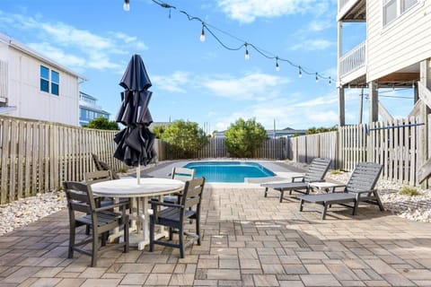 Relax in your own private pool surrounded by comfortable loungers and outdoor seating.