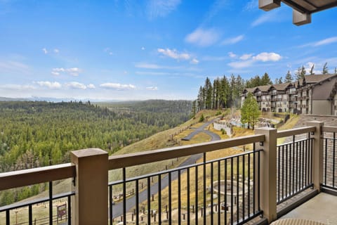 Take in sweeping panoramic views of rolling evergreen forests and distant mountain peaks from your private balcony. The elevated vantage point offers peaceful seclusion and endless skies—perfect for morning coffee or a quiet sunset moment.