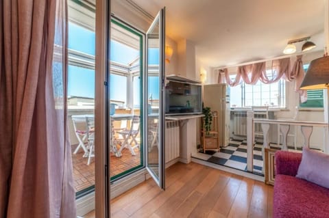 Apartment, City View | Living area | Flat-screen TV