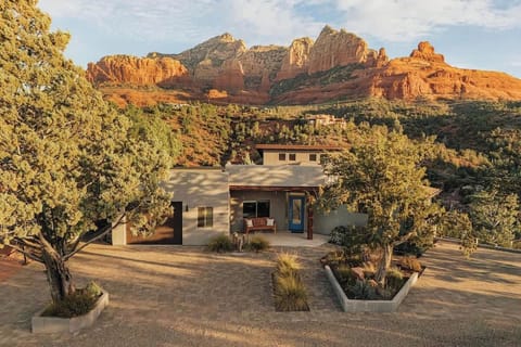 Modern desert retreat set against dramatic red rock formations in Sedona's stunning landscape.