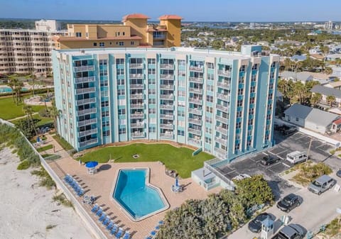 Direct oceanfront condo building with pool and beach access.