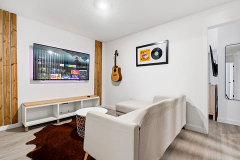 Cozy TV lounge with comfy seating and streaming entertainment