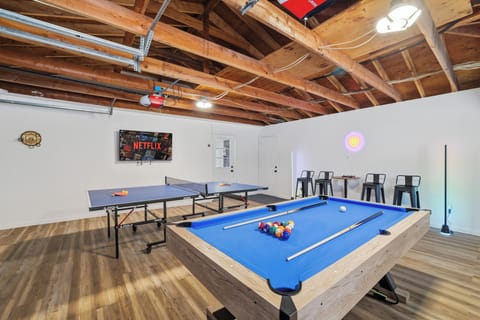 Game room with pool table, ping pong, and space for group fun