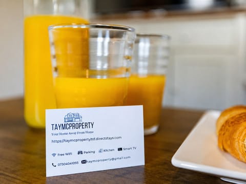Welcome refreshment setup with breakfast touches and guest amenities