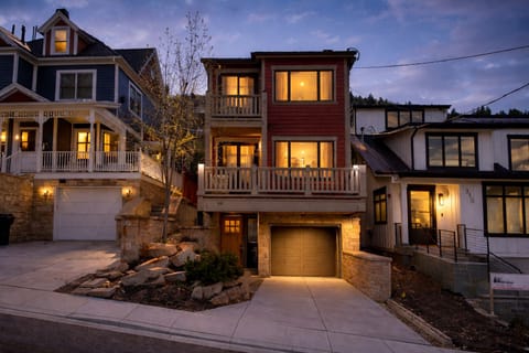 Warmly lit and welcoming, this classic Old Town home features a private entrance, garage, and inviting balcony—just steps from the heart of Park City.