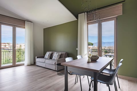 Deluxe Apartment | Living area | TV
