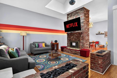 Living Room: Bright, welcoming living space with warm, homey touches.