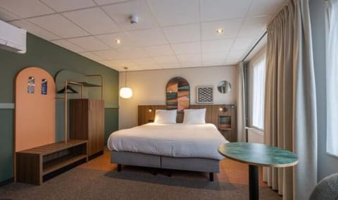 Stretch out in a calm, modern room with soft lighting.