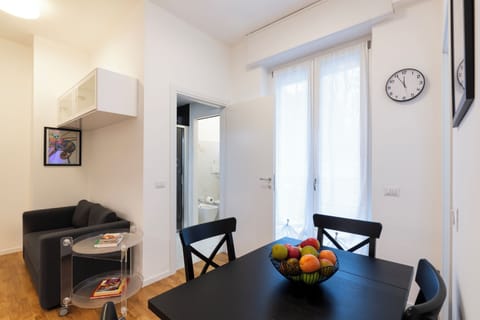 Comfort Apartment, Balcony | Living area | 32-inch Smart TV with digital channels