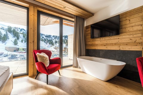 Superior Studio, Balcony, Mountain View | Living area | TV
