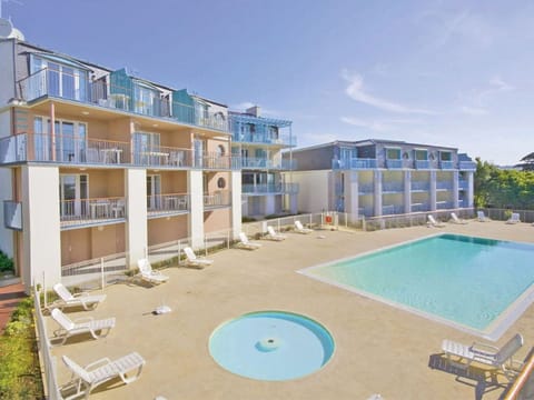 Dive into relaxation by the sparkling pool, surrounded by inviting sun loungers.