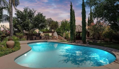 Escape to your heated pool, surrounded by peaceful trees, and indulge in ultimate relaxation.
