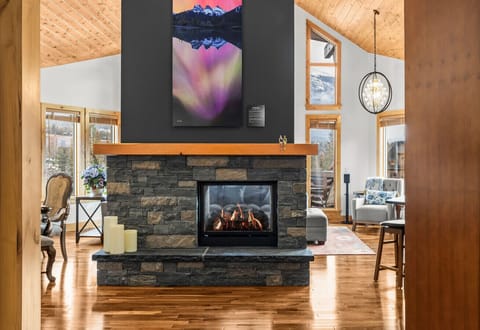 Stone fireplace glow—your perfect wind‑down after a day outdoors.