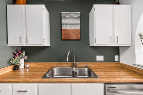 Clean, spacious countertops and a modern sink setup make prep and cleanup feel effortless. It’s a kitchen detail that keeps everything simple, smooth, and enjoyable.
