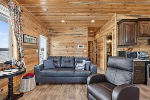 Living Room: Queen Sofa Bed + Gas Fire Place