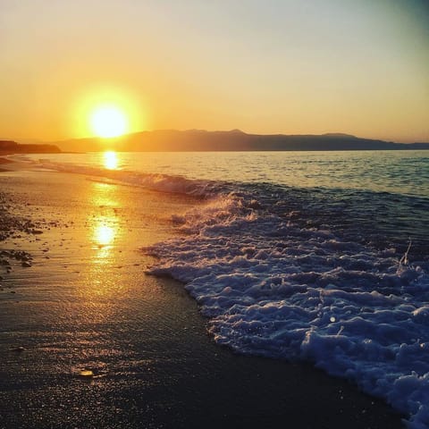 On the beach, sun loungers, beach umbrellas, beach towels