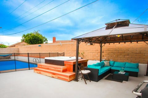 Backyard with pool and hot tub