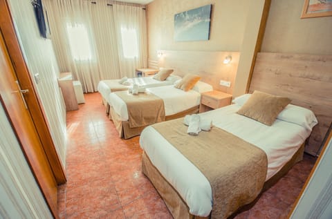 Triple Room | Blackout drapes, soundproofing, iron/ironing board, cribs/infant beds