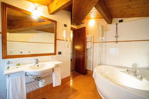 Suite | Bathroom | Designer toiletries, hair dryer, bidet