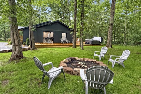 Step out french doors from kitchen to enjoy the large 8-seat hot tub and firepit area