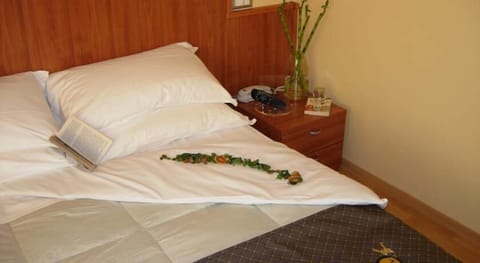 Premium bedding, in-room safe, desk, soundproofing