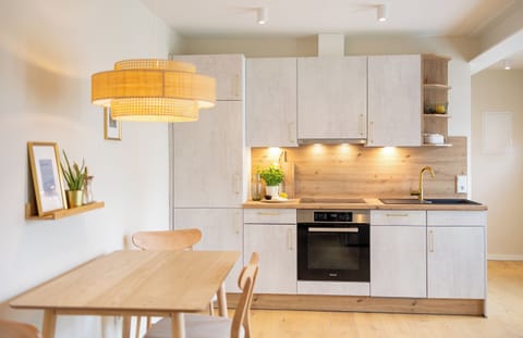 Apartment Salz/House Queller in Wittdün/Amrum  Gallery kitchen with a dining table