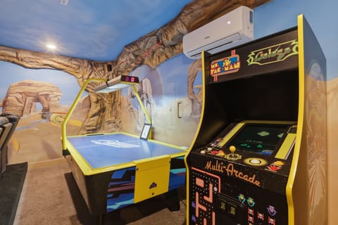 The entertainment never stops with a private theater, air hockey, and a classic multicade arcade loaded with retro favorites.