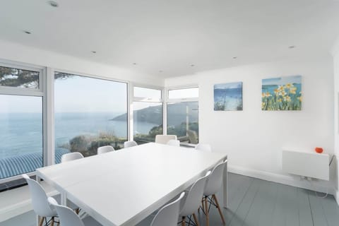 Flexible set up with dining for 8 and a desk area or dining for 12