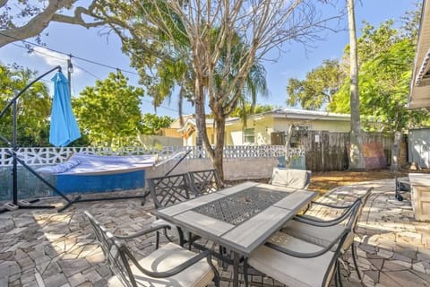 Fenced-In backyard with outdoor furniture!