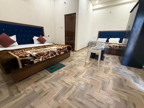 Family Quadruple Room, Garden View | Laptop workspace, free WiFi