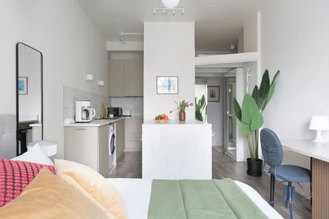 Standard Apartment, Courtyard View | Desk, blackout drapes, iron/ironing board, travel crib