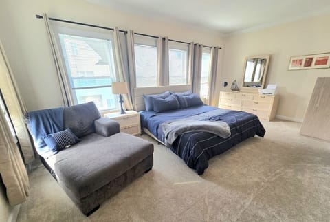 The primary bedroom has a king bed, attached bath, and additional closet space for your luggage.